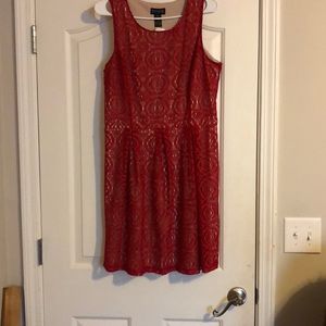 RED SLEEVES LACE WITH NUDE SLIP UNDER IT